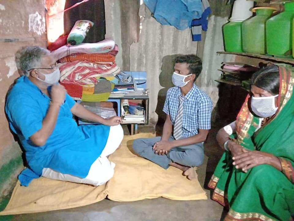 Suresh Kumar visits maidservant's son who aced SSLC exams