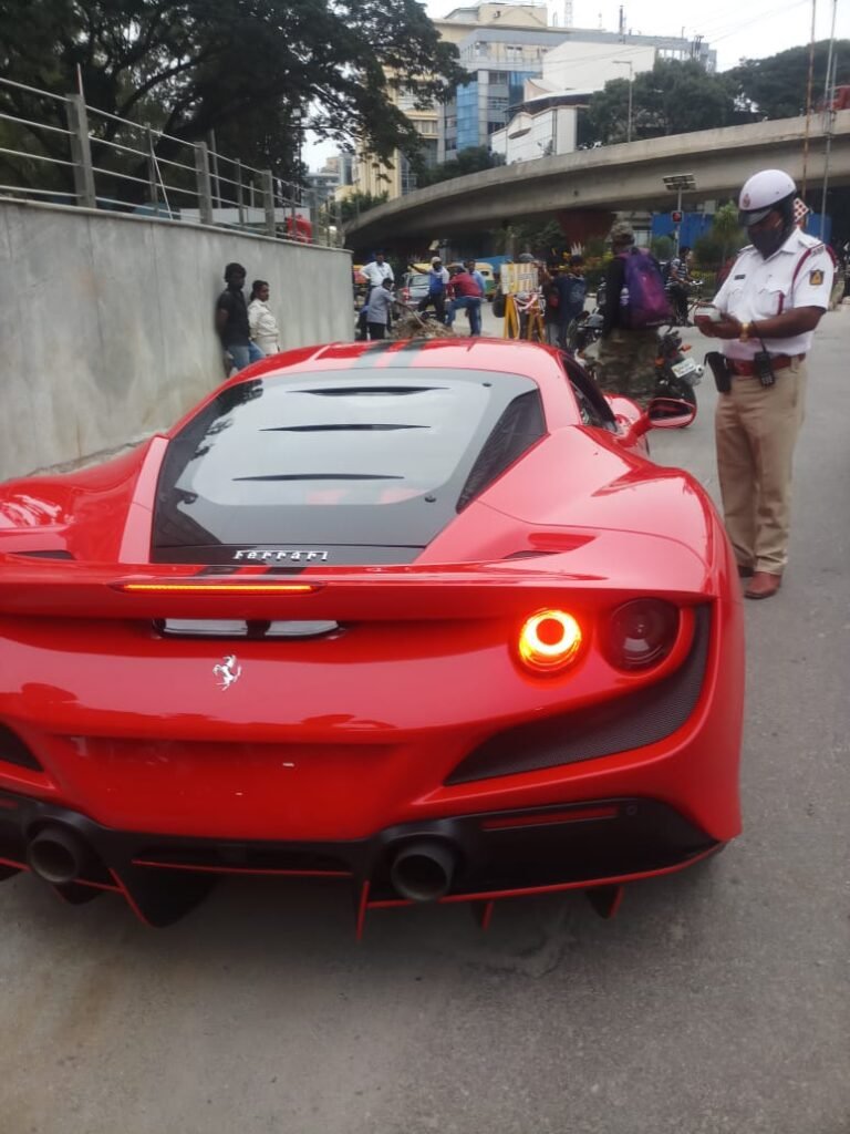 Ferrari or no Ferrari, traffic cop does his duty!