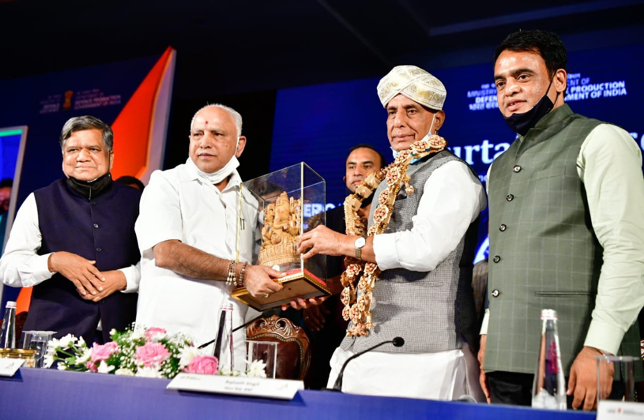 Rajnath Singh with CM at a AeroIndia2021 curtain raiser event
