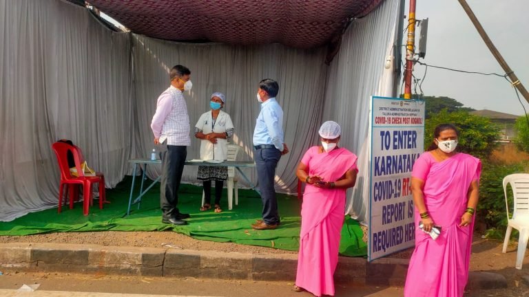 Belgaum Deputy Commissioner MG Hiremath inspects one of check post at Belgaum-Kolhapur border.