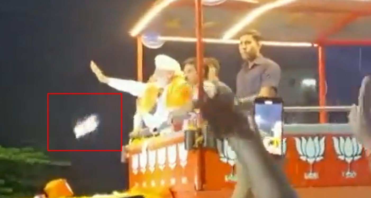 Mobile phone thrown towards PM Modi during Mysuru roadshow, police claims no ill intention 1 Mobile phone thrown towards PM Modi during Mysuru roadshow, police claims no ill intention