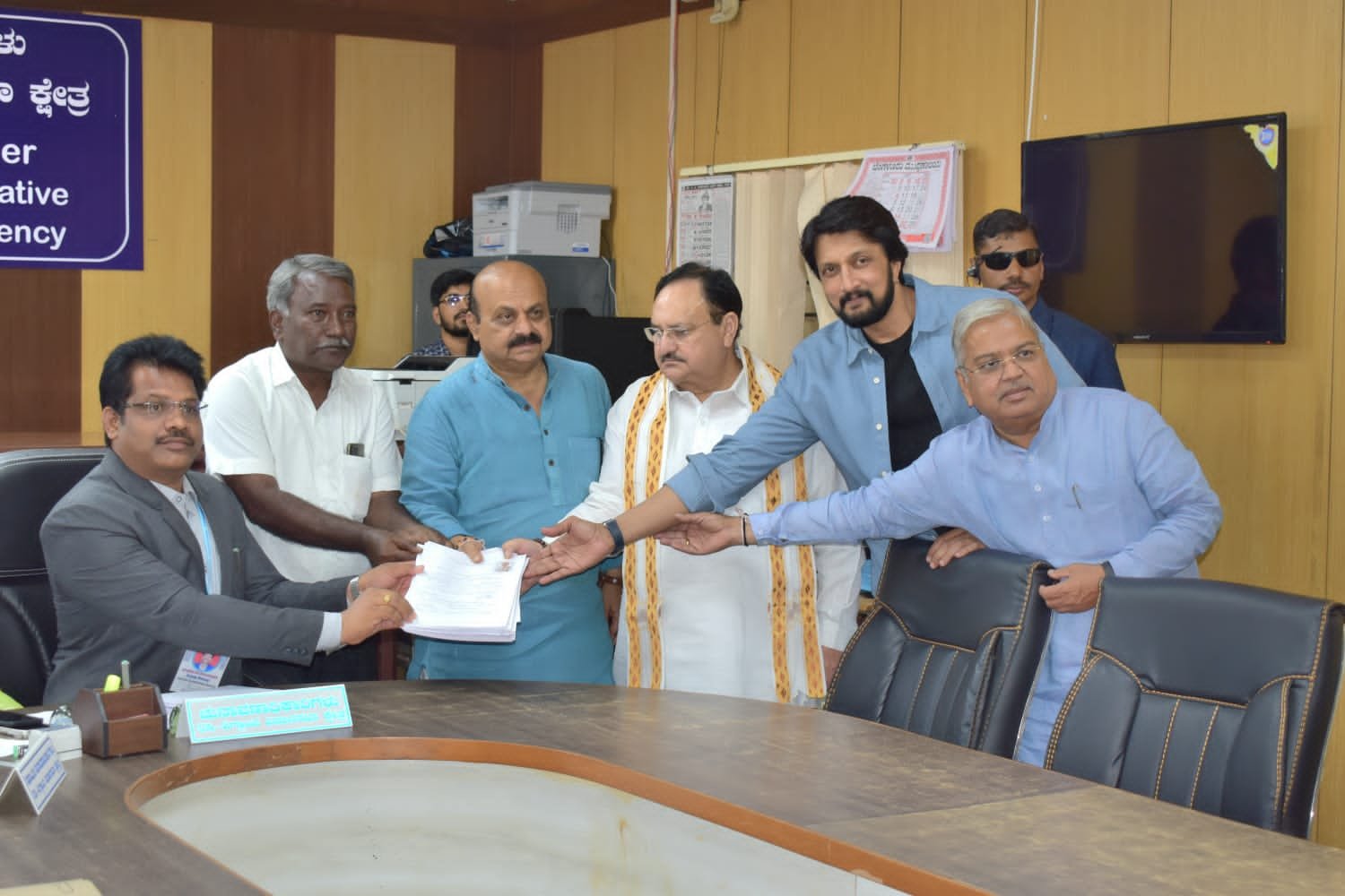 Accompanied by Nadda and Sudeep, CM files nomination amid fanfare in Shiggaon 1 Accompanied by Nadda and Sudeep, CM files nomination amid fanfare in Shiggaon