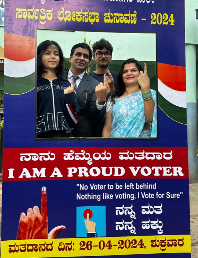 Election Commission of India's Karnataka's Chief Executive Officer, IAS Manoj Kumar Meena with his family members.