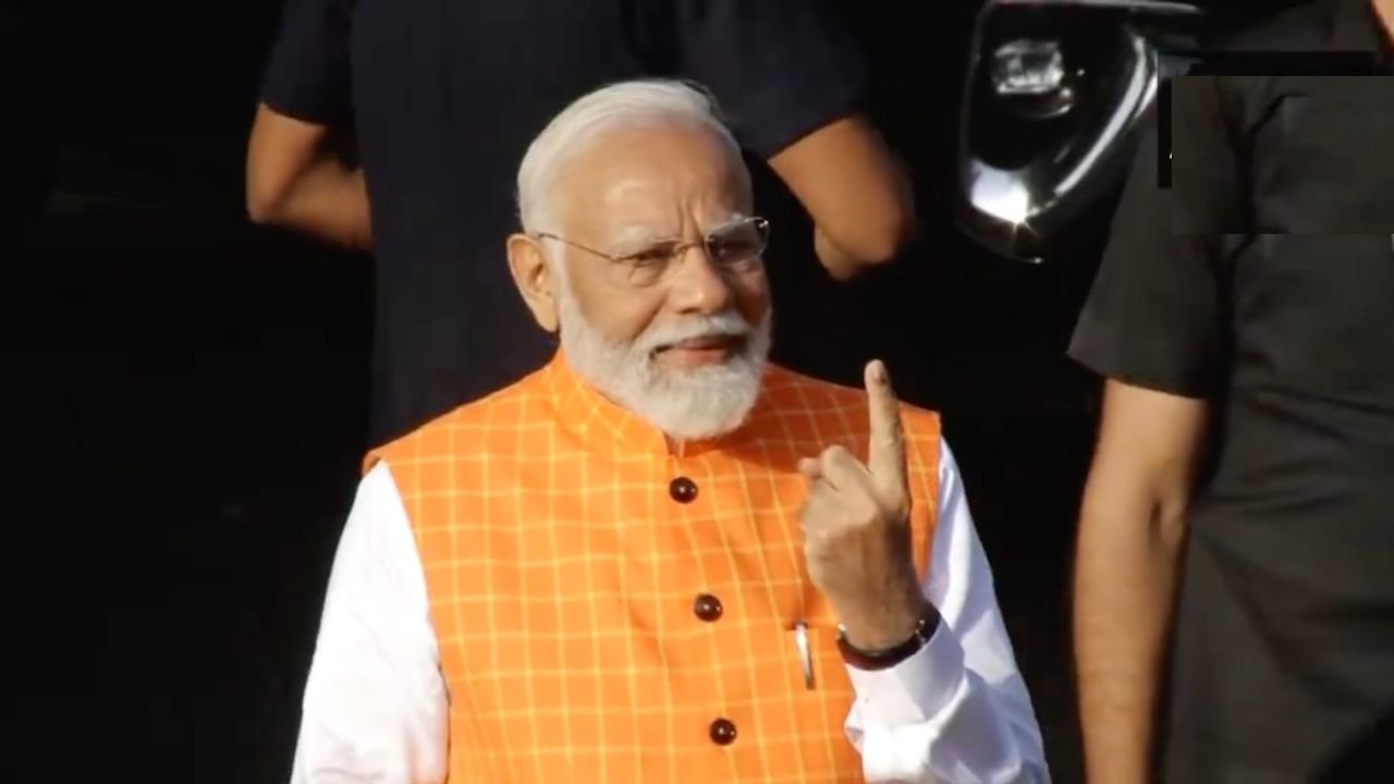 PM Modi votes at polling booth in Gandhinagar Lok Sabha constituency 1 PM Modi votes at polling booth in Gandhinagar Lok Sabha constituency