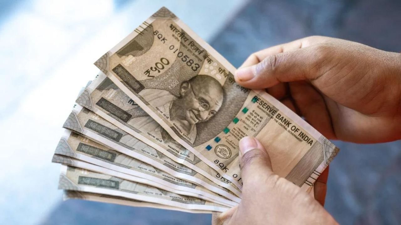 Rupee falls 11 paise to revisit all-time low of 84.09 against US dollar